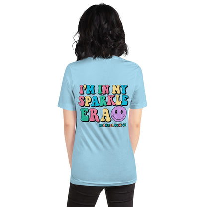 I'm in my colorful Sparkle Era t-shirt